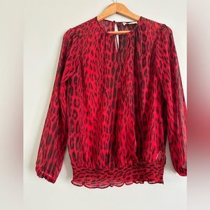 Michael Kors red leopard surplice long sleeve sheer V neck shirt.